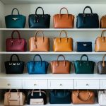 A stylish and functional wardrobe with 10 essential handbags neatly arranged on a shelf, showcasing a variety of sizes, colors, and designs