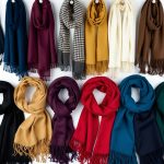 A collection of scarves and shawls arranged in a visually appealing manner, showcasing different ways to wear them creatively